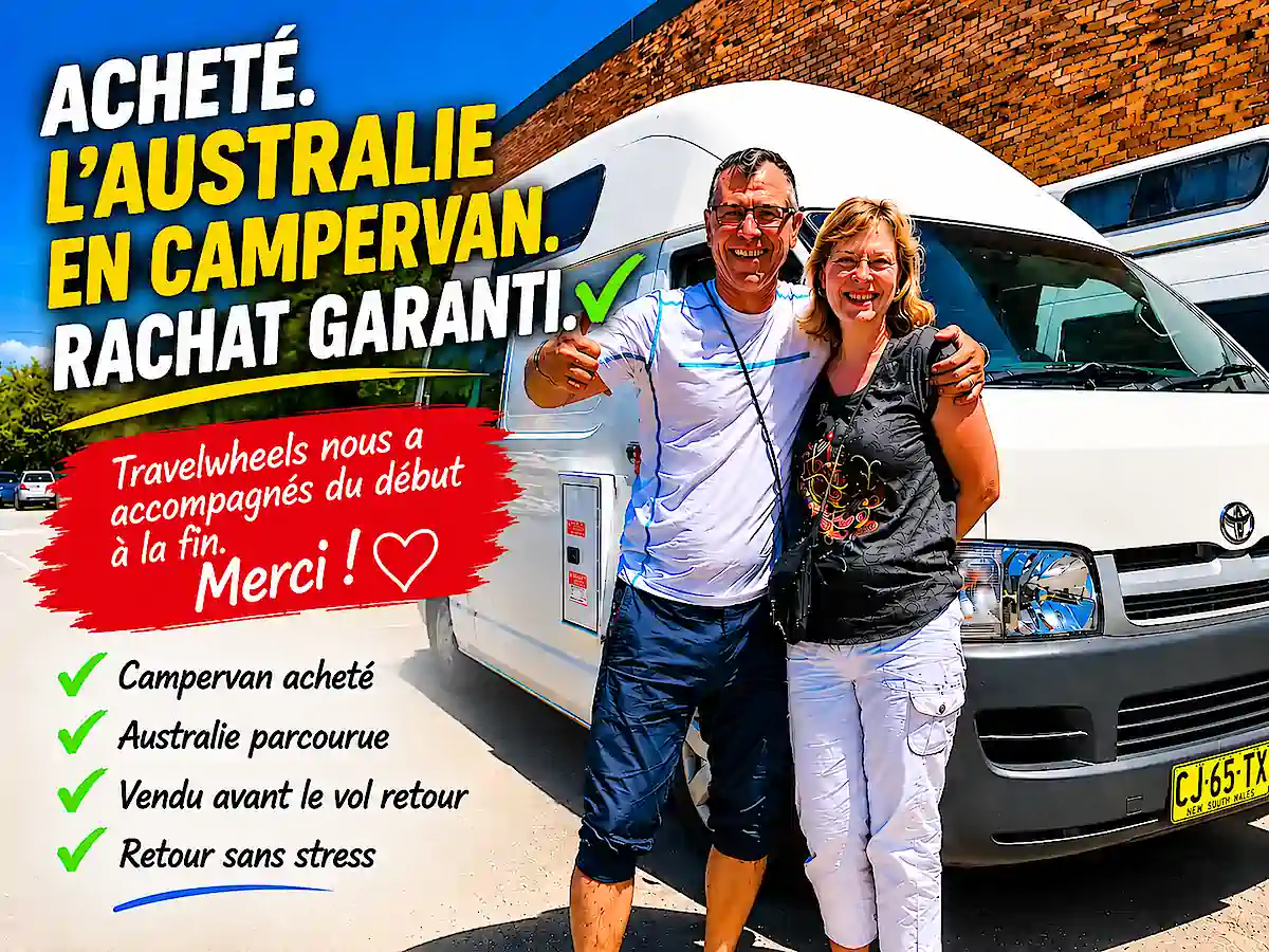 Couple de voyageurs souriant devant leur campervan Toyota chez Travelwheels à Sydney après leur voyage en Australie, illustrant le rachat garanti : campervan acheté, road trip en Australie, véhicule revendu avant le vol retour et départ sans stress.